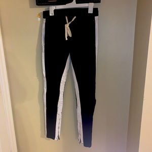 Black pants with white strips